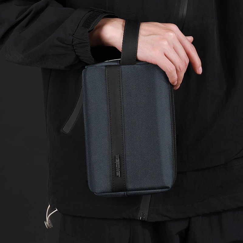 Travel Organizer Men - กระเป๋าคลัทช์ผู้ชายแบบใหม่ พร้อมสายคล้องข้อมือ กระเป๋าใส่ของใช้ในห้องน้ำแบบกันน้ำ ทำจากไนลอน พร้อมหูหิ้ว สำหรับจัดเก็บเครื่องสำอาง